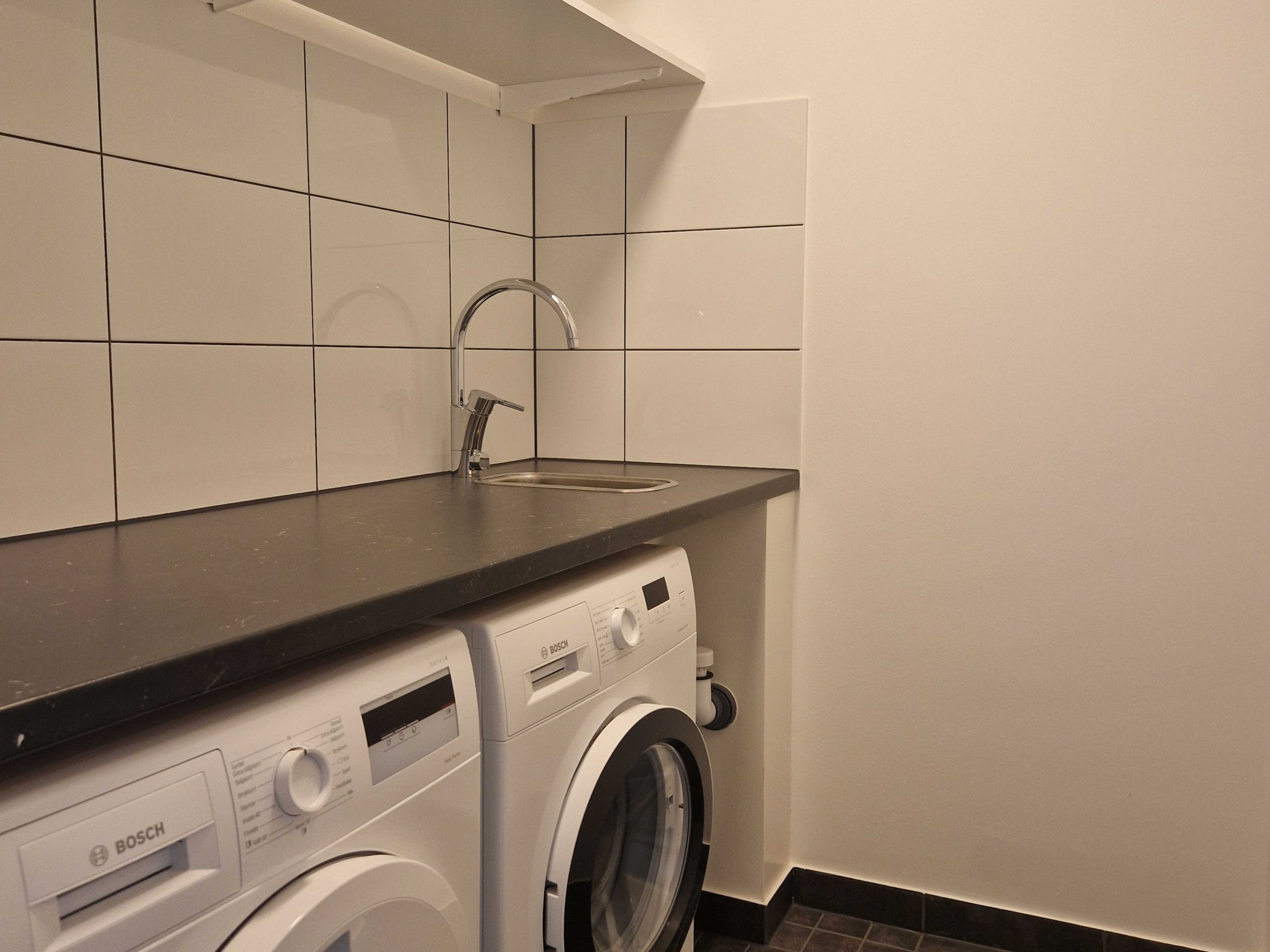 Tvättrum i modern tvåa på Vattugatan 4 i Halmstad